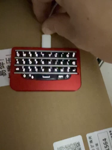 Click to view full screen BBQ10KBD Mini Berry Keyboard photo review