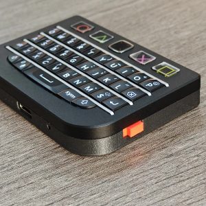 Black BBQ10KBD Pro keyboard showing its side control and compact body